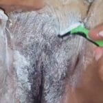 Her man is shaving her pussy clean on a closeup