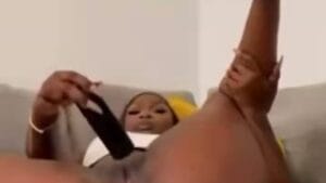Dancehall Khandy Masturbates With TV Remote